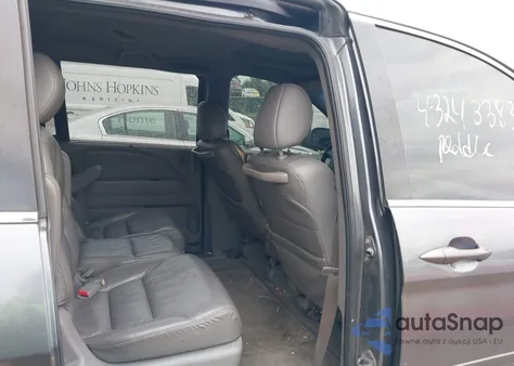 2010 Honda Odyssey Ex-L z USA, uszkodzony, nr VIN 5FNRL3H69AB087179